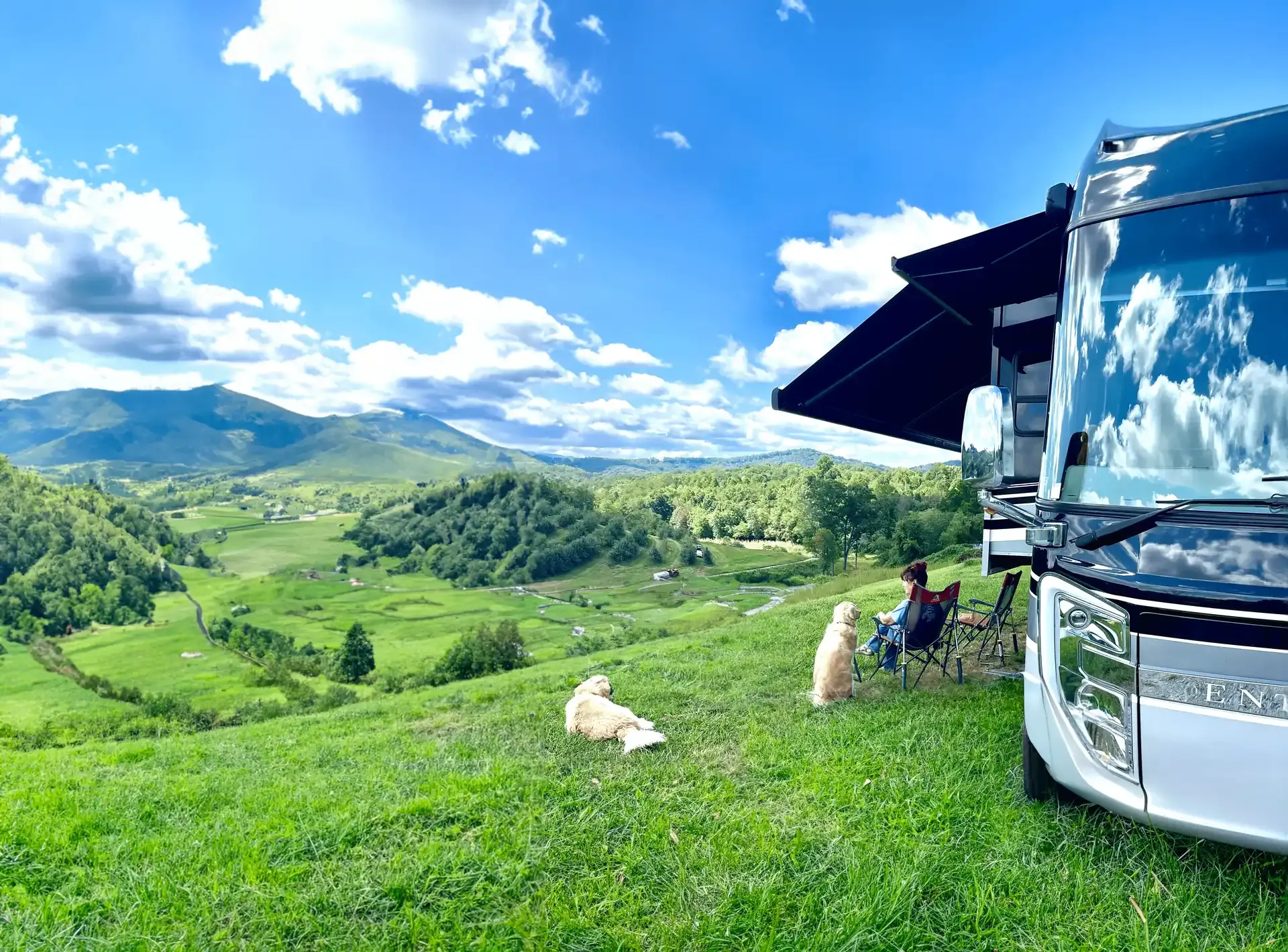 RV parked next to a field